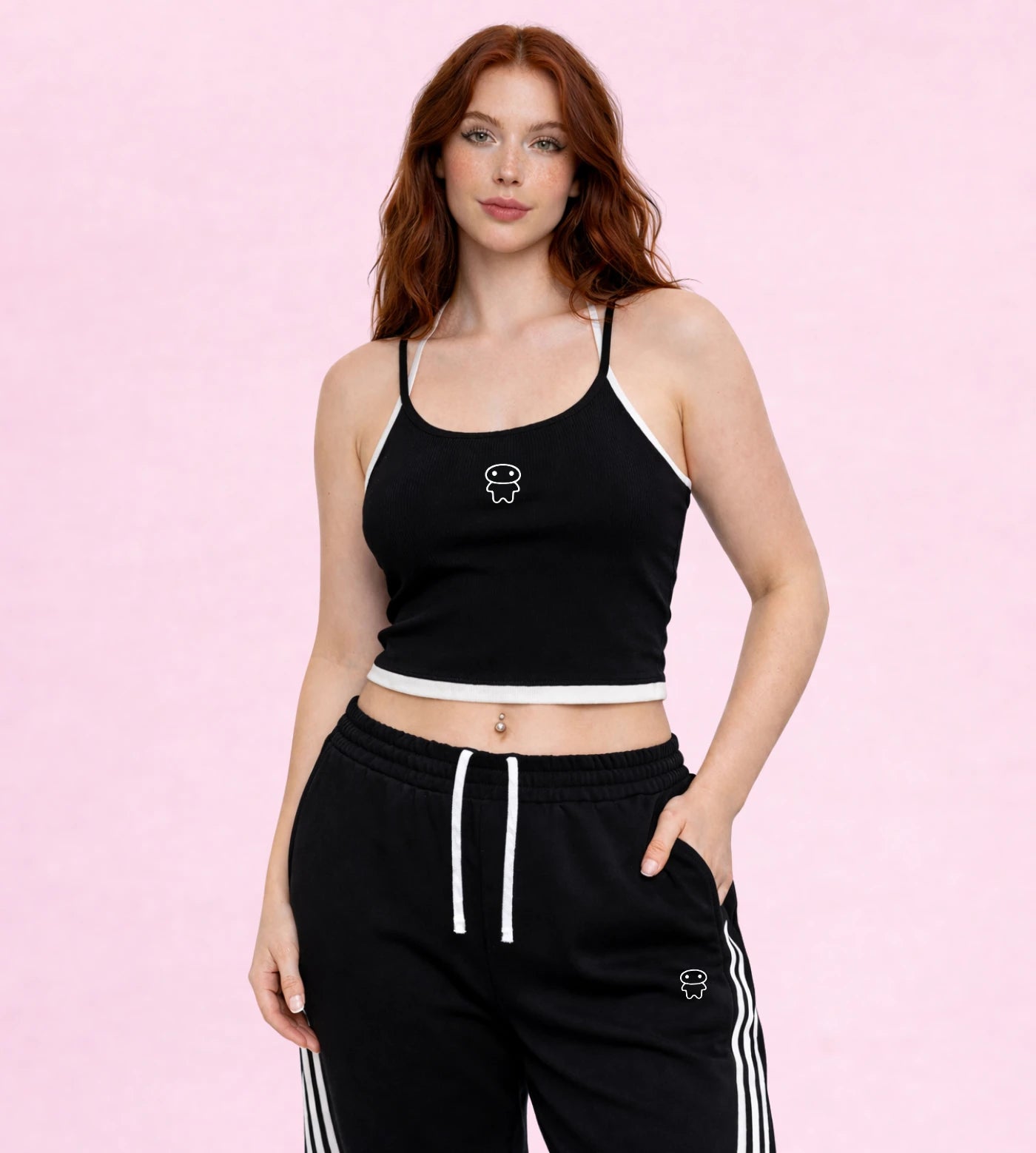 Model wears a black contrast halter crop top featuring a Lil Alien Bae graphic.
