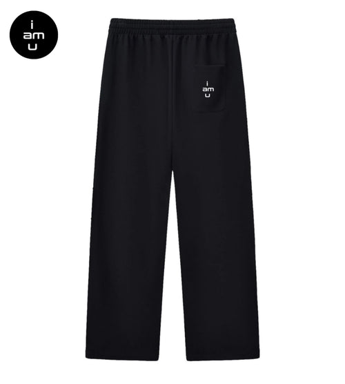 Black curved stripe sweatpants featuring a small "i am u" pocket graphic. 