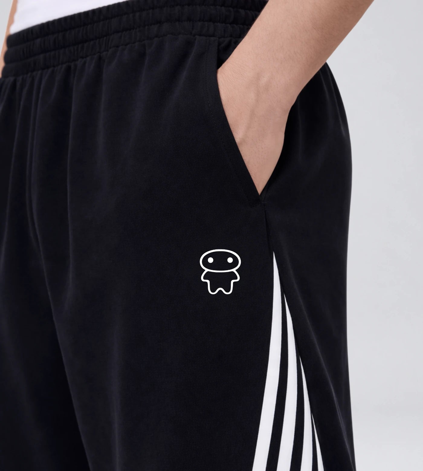 Close up detail of Stripes and Lil Alien Bae graphic. 