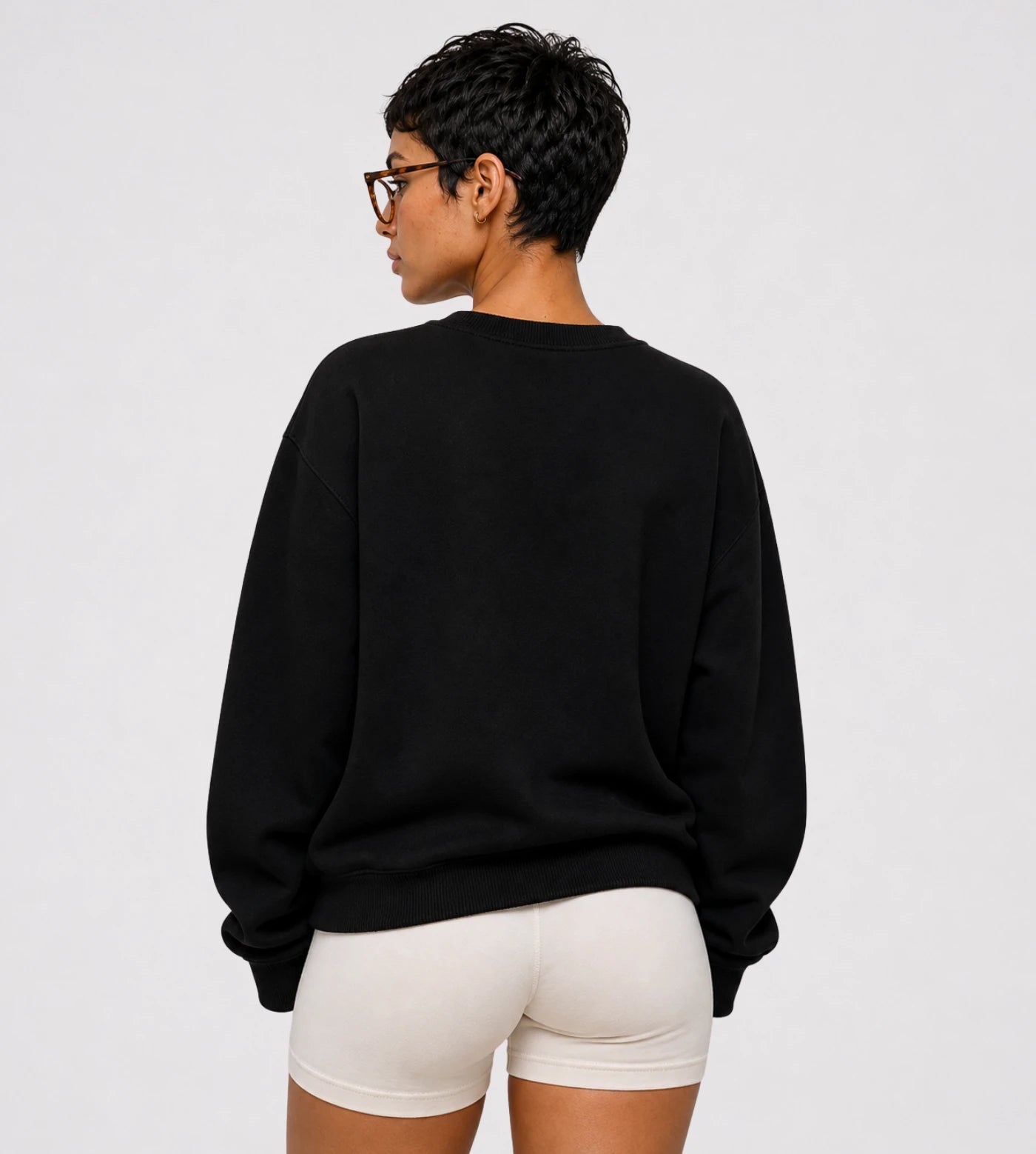 Model wears a black heavyweight cotton sweatshir