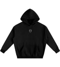 Black oversized fleece hoodie featuring a small Lil Alien Bae graphic. 