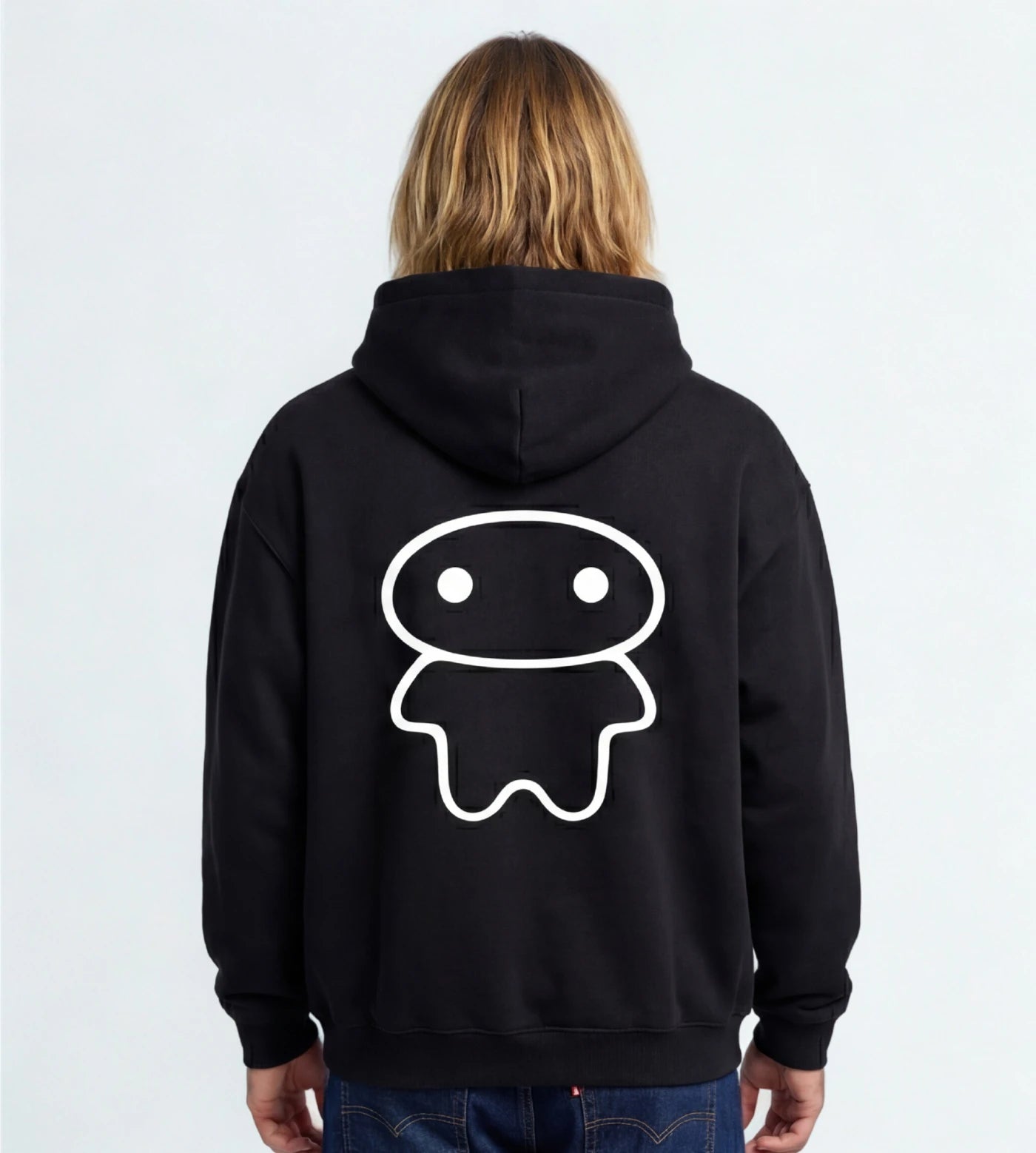Model wears a black oversized fleece hoodie featuring a Lil Alien Bae back graphic. 