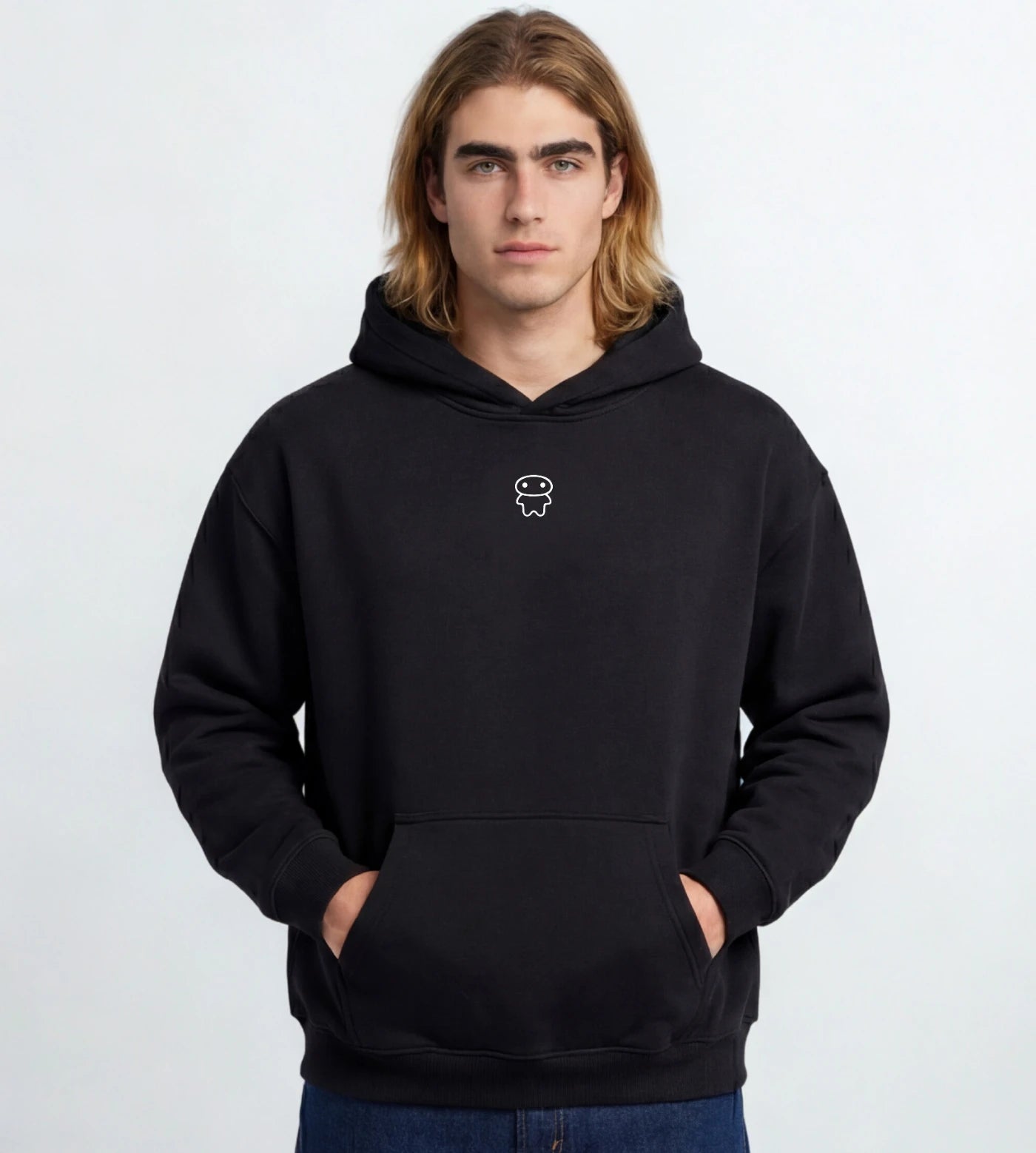 Model wears a black oversized fleece hoodie featuring a small Lil Alien Bae graphic. 