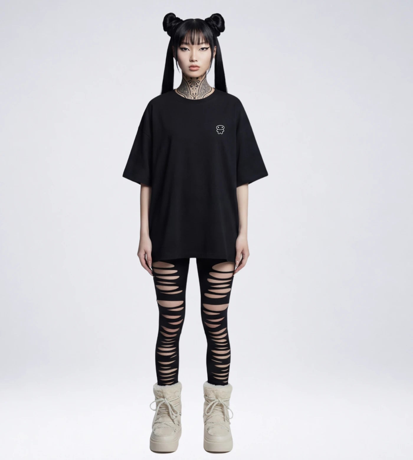 Model wears a black wide fit cotton T-shirt featuring a Lil Alien Bae chest graphic with a styled outfit.  