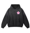 Black sunfaded oversized hoodie featuring a Lil Alien Bae sakura chest graphic. 