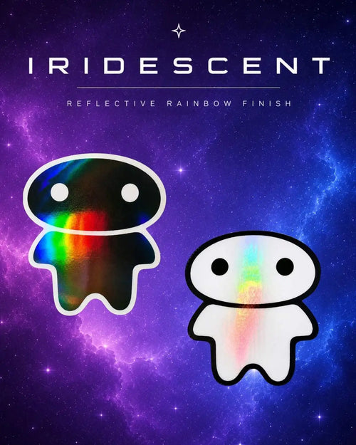 Promotional graphic for Iridescent reflective rainbow finish, showing two lil alein bae vinyl stickers on a purple and blue galaxy background. 