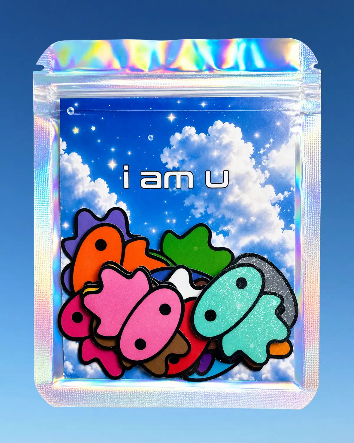 A pack of rainbow colored lil alien bae vinyl stickers inside a holographic zip pouch. 