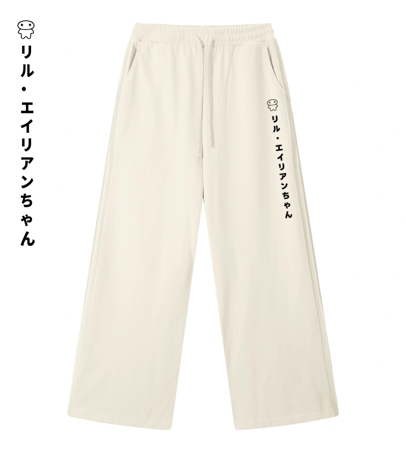 Light cream straight-leg sweatpants featuring Lil Alien Bae in Japanese.  