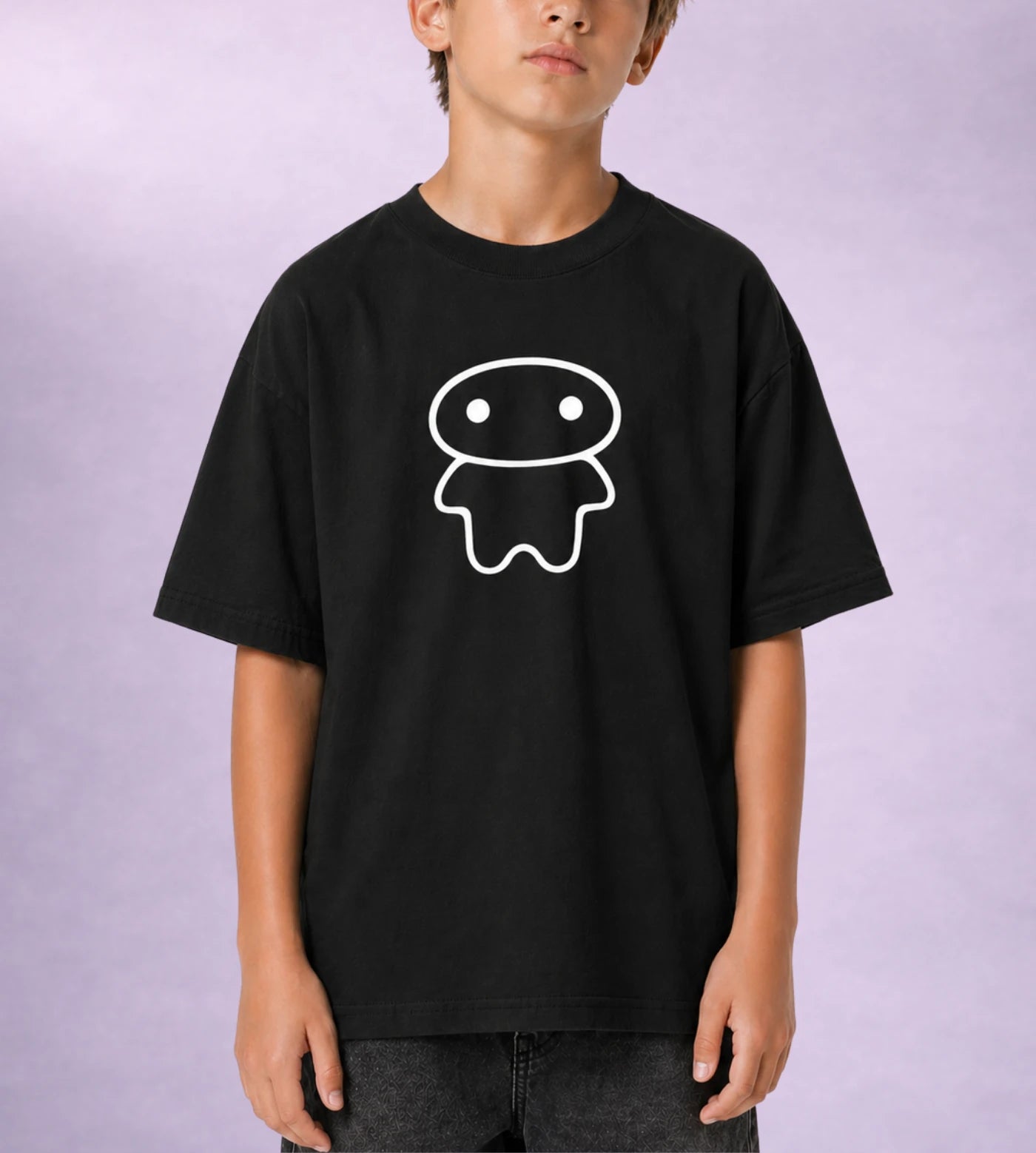 Model wears a youth black cotton T-shirt featuring a Lil Alien Bae graphic.  