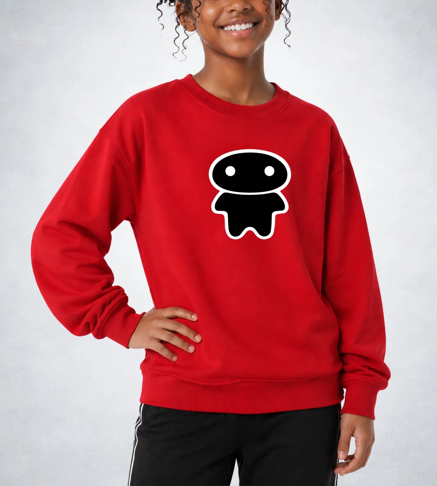 Model wears a youth red fleece sweatshirt featuring a Lil Alien Bae graphic. 