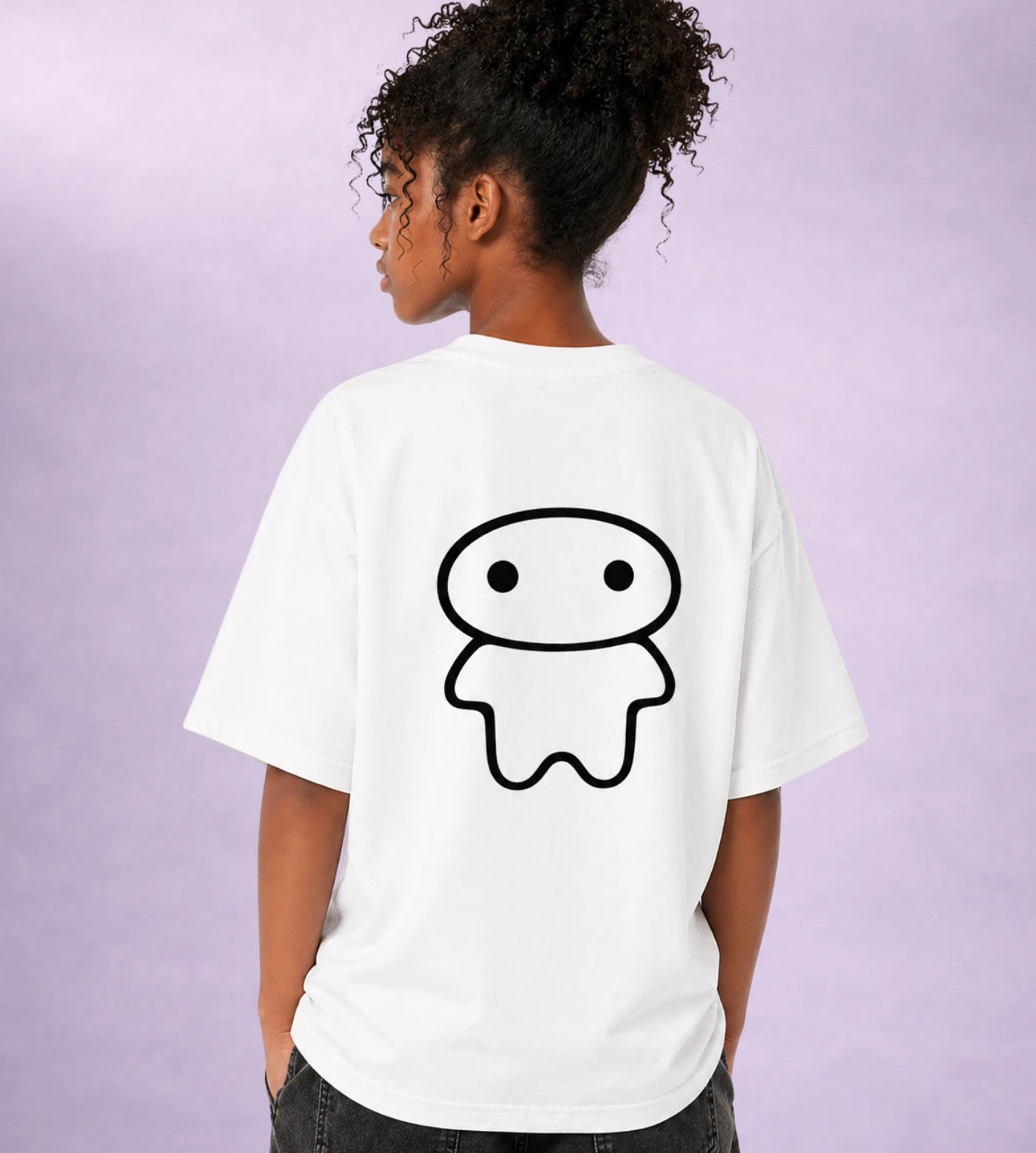 Model wears a youth white cotton T-shirt featuring a Lil Alien Bae back graphic. 