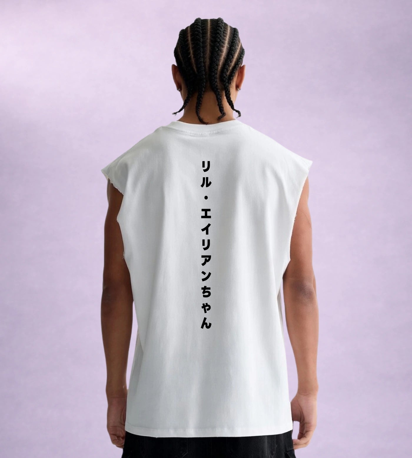Model wears a white sleeveless cotton shirt featuring a Japanese Lil Alien Bae back graphic. 