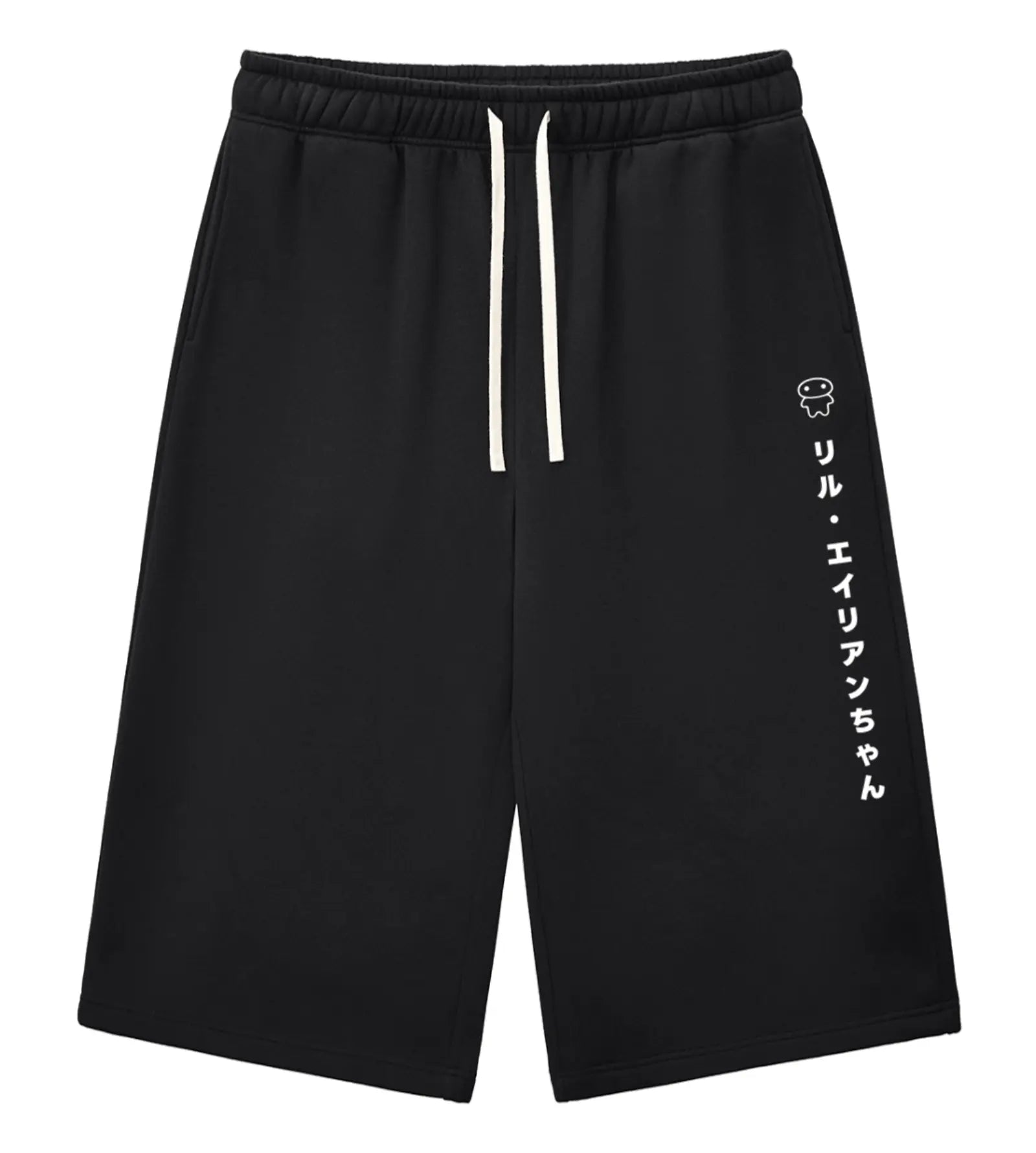Black athletic shorts with a white drawstring and white vertical Japanese text printed on the left leg, shown against a plain white background.