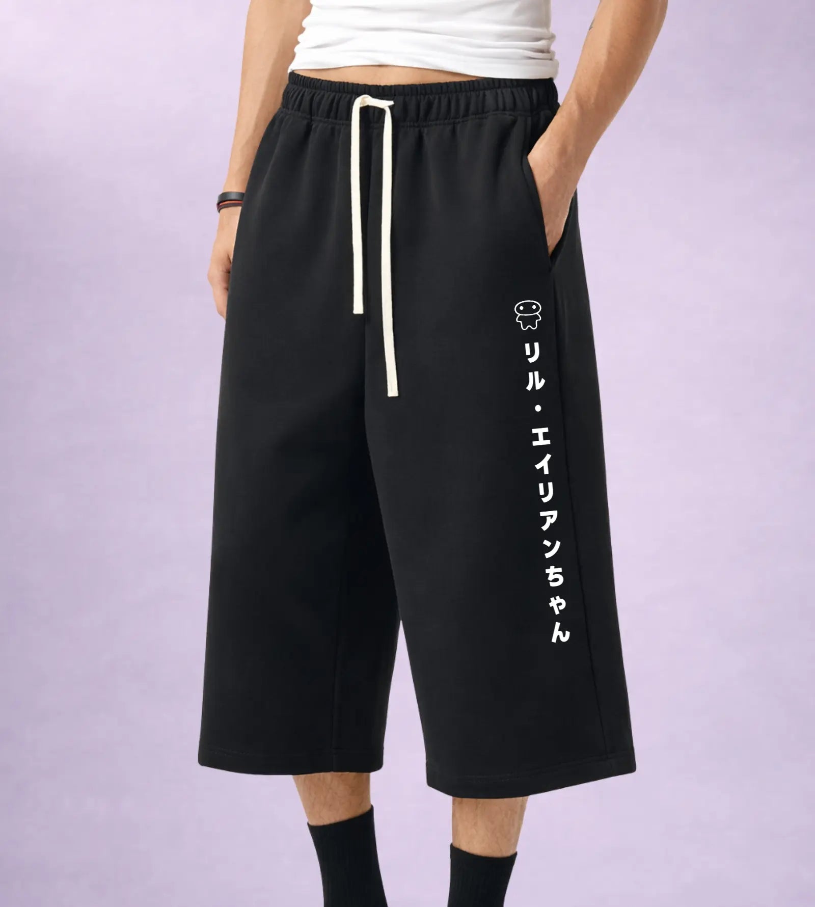 Black shorts with white text on a light purple background