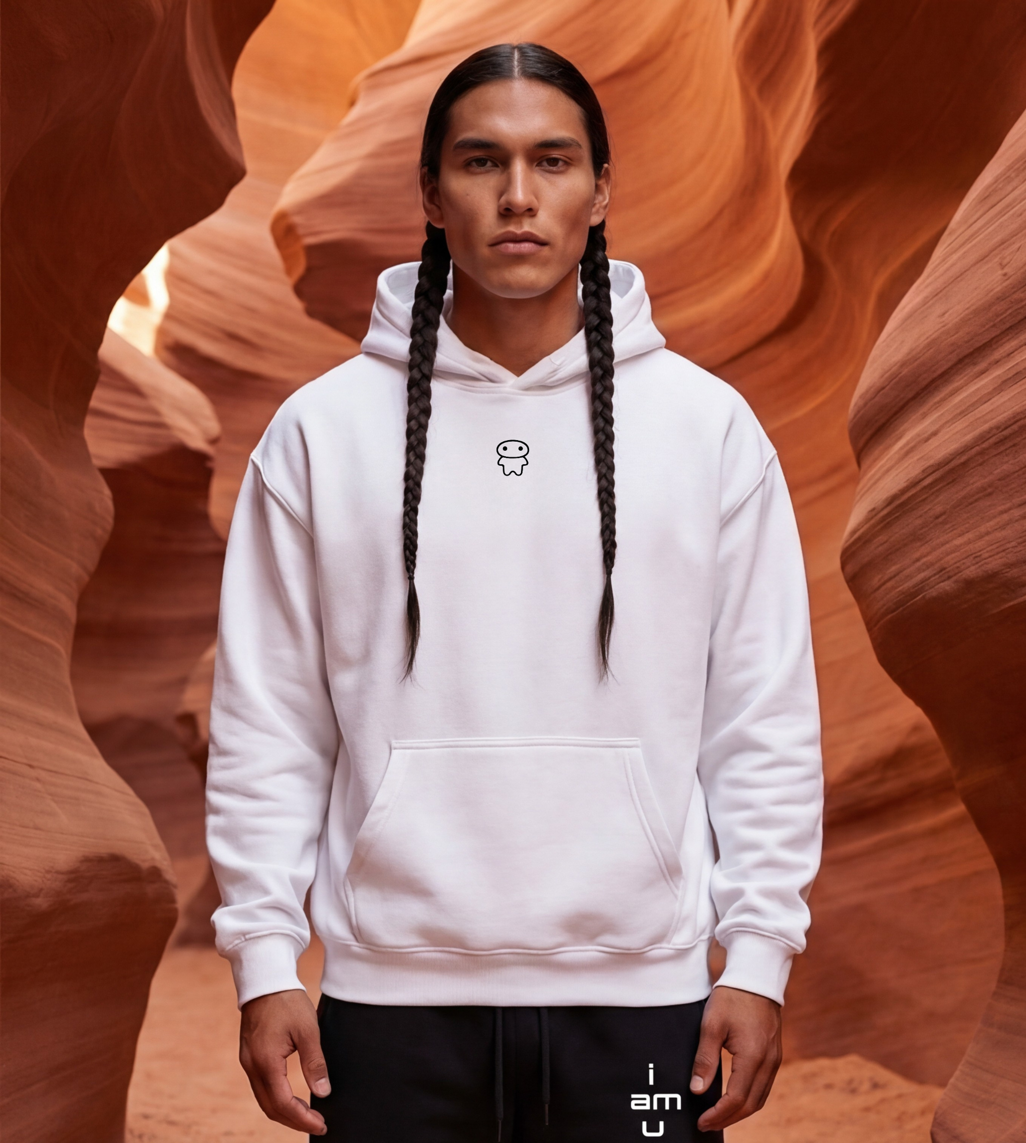 Model wearing a white oversized graphic fleece hoodie with a small lil alien bae chest logo.