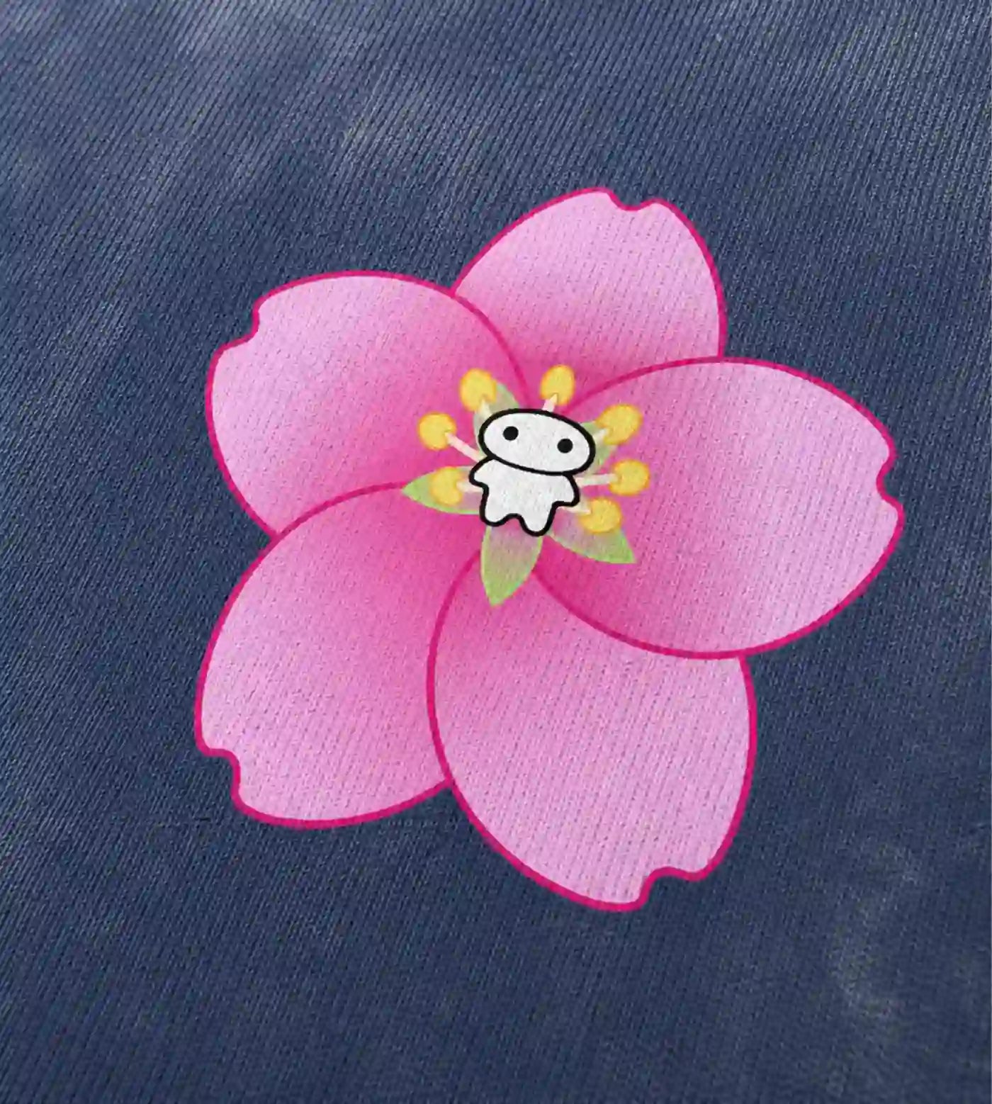 Close up detail of Lil Alien Bae sakura graphic. 