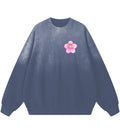 Sunfaded blue gray cotton sweatshirt featuring a Lil Alien Bae sakura chest graphic. 