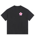 Vintage washed black oversized T-shirt featuring a Lil Alien Bae sakura chest graphic. 