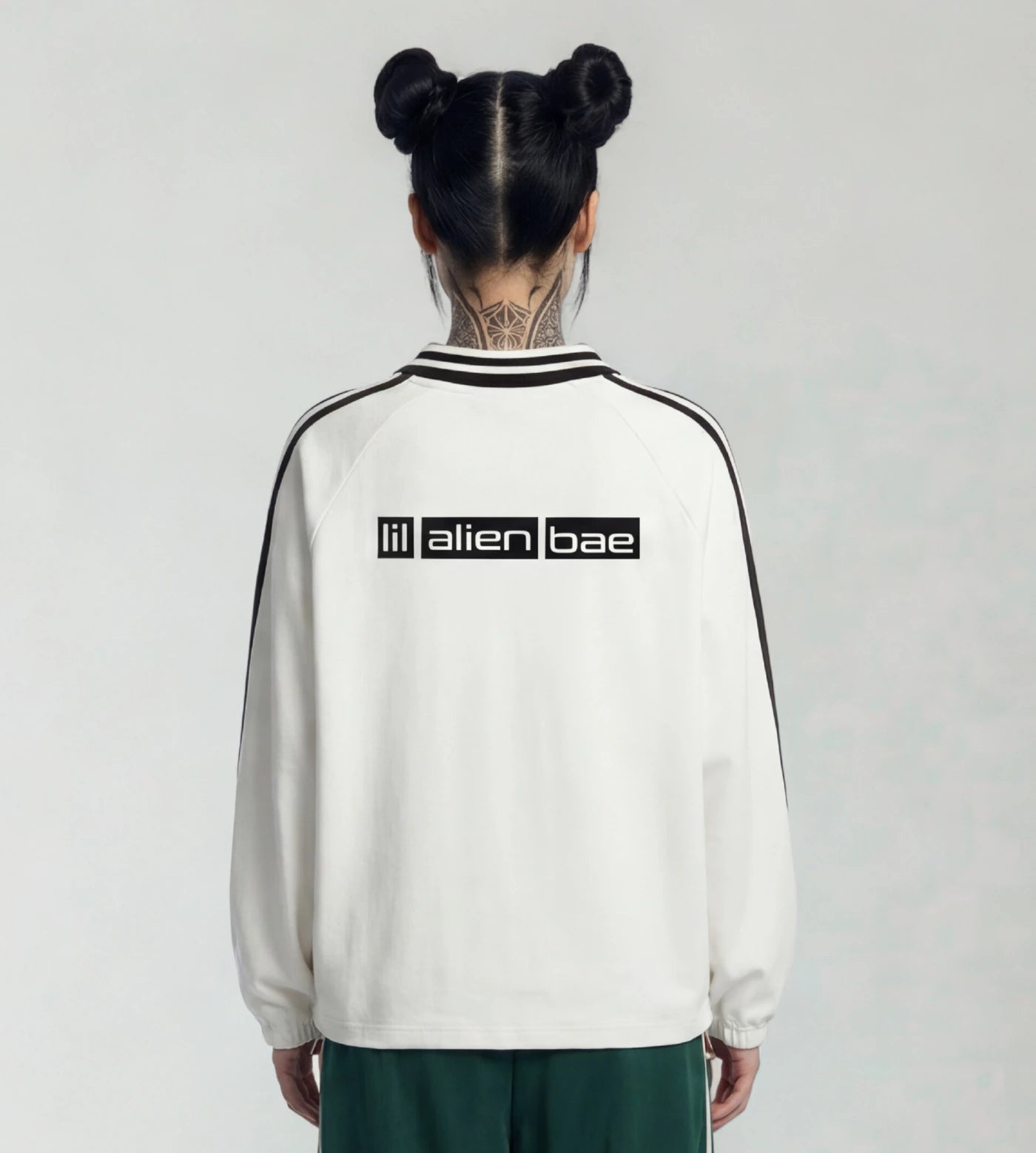 Off white lapel collar pullover featuring a Lil Alien Bae back graphic.