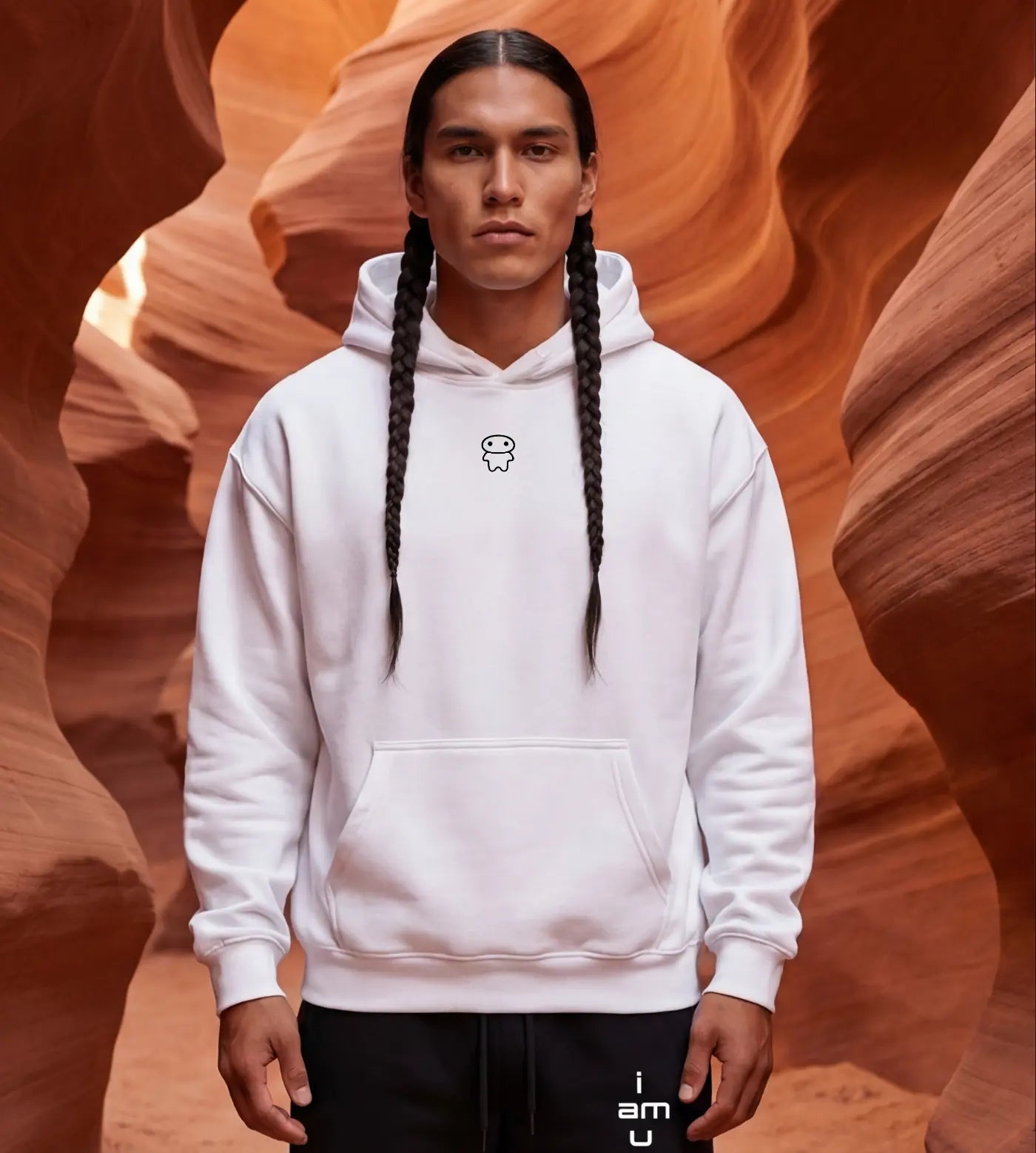 Model wears a white oversized fleece hoodie with a small Lil Alien Bae graphic.  