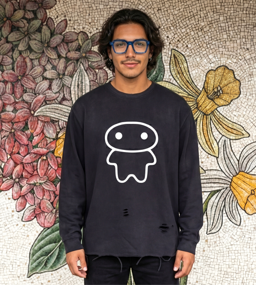 Black vintage washed long sleeve graphic shirt with ripped hem features large lil alien bae logo.