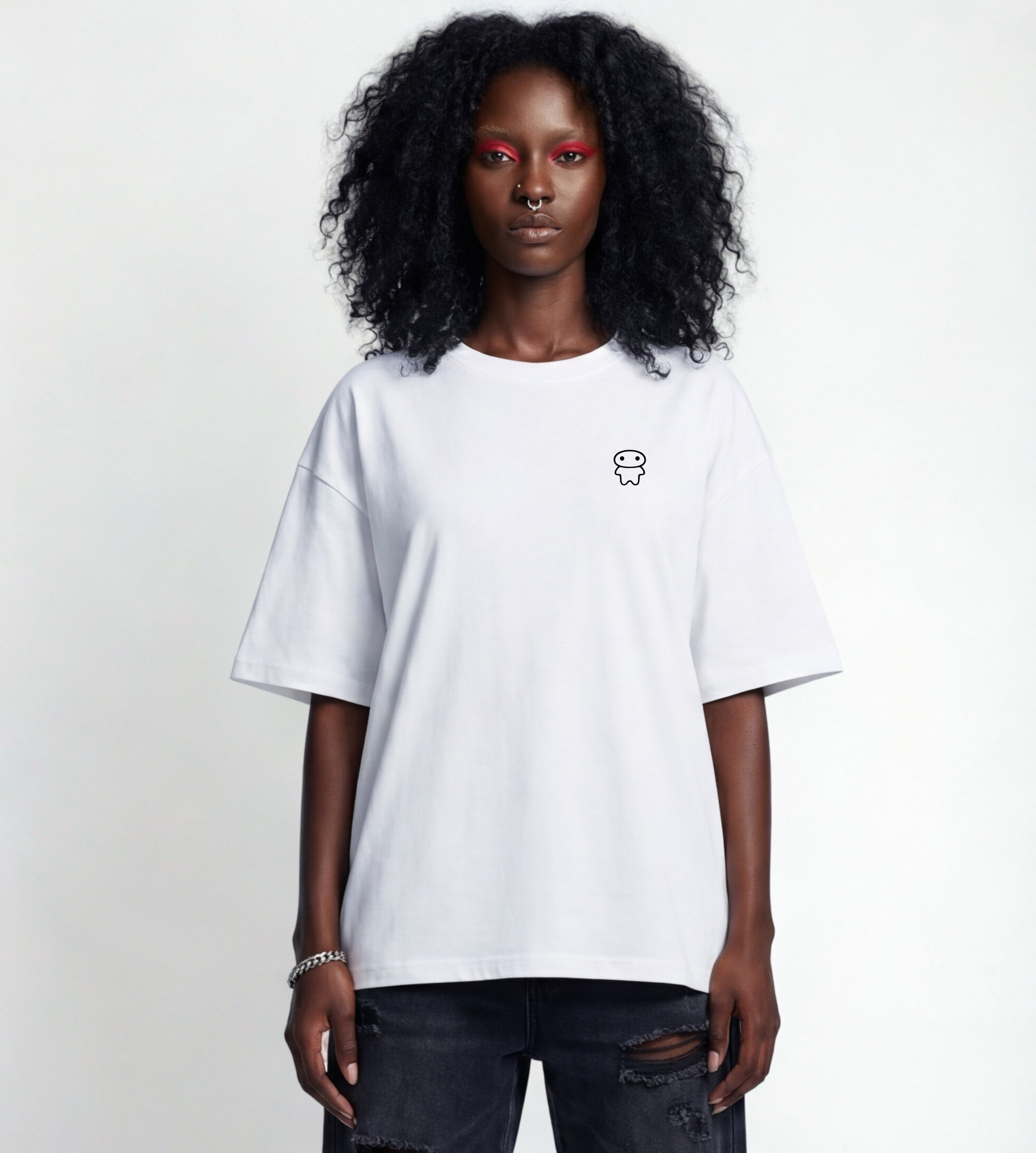 Oversized unisex white graphic T-shirt features  lil alien bae chest logo design.  